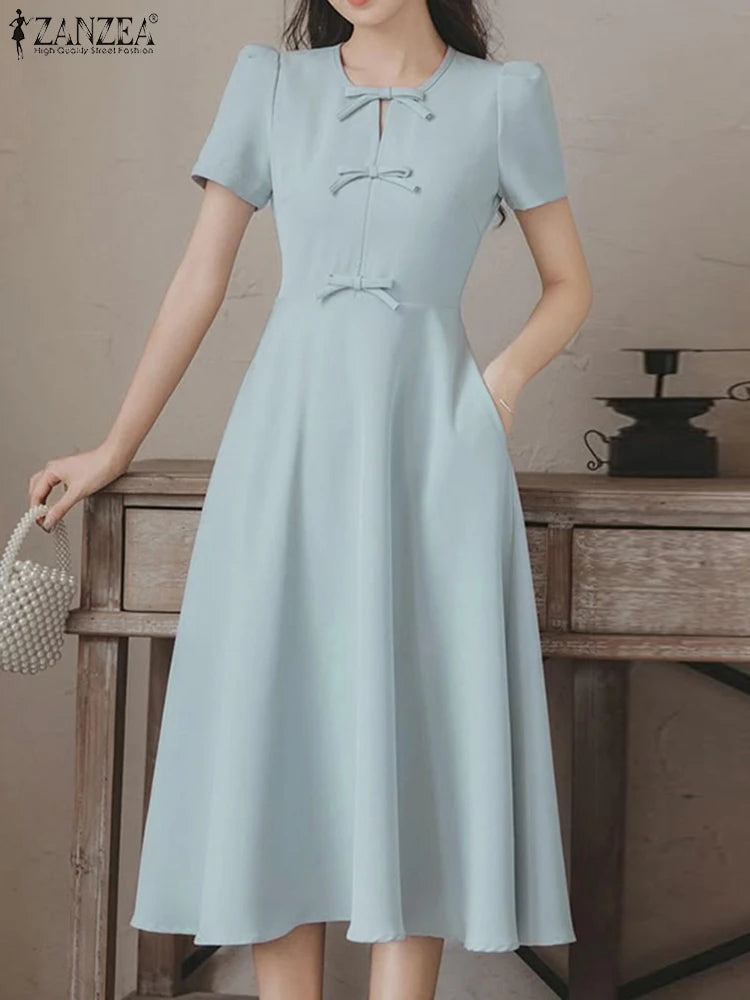 BlueWave Puff – Vestido Elegante con Manga Globo y Lazo Frontal