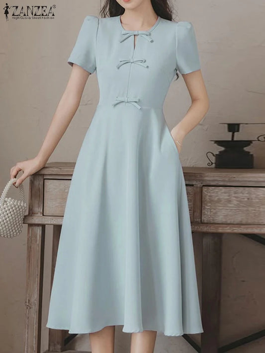 BlueWave Puff – Vestido Elegante con Manga Globo y Lazo Frontal